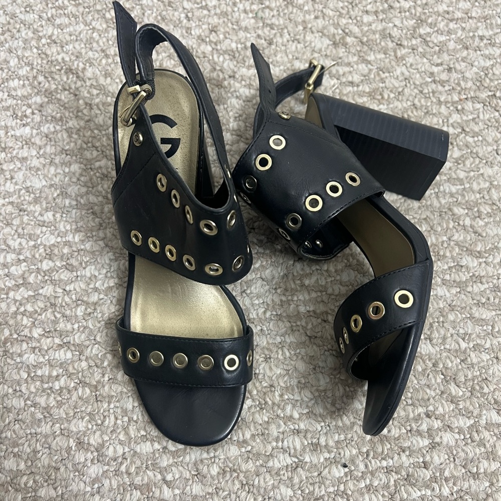 G by Guess Black Leather Block Heel Sandals with Gold Eyelet Accents